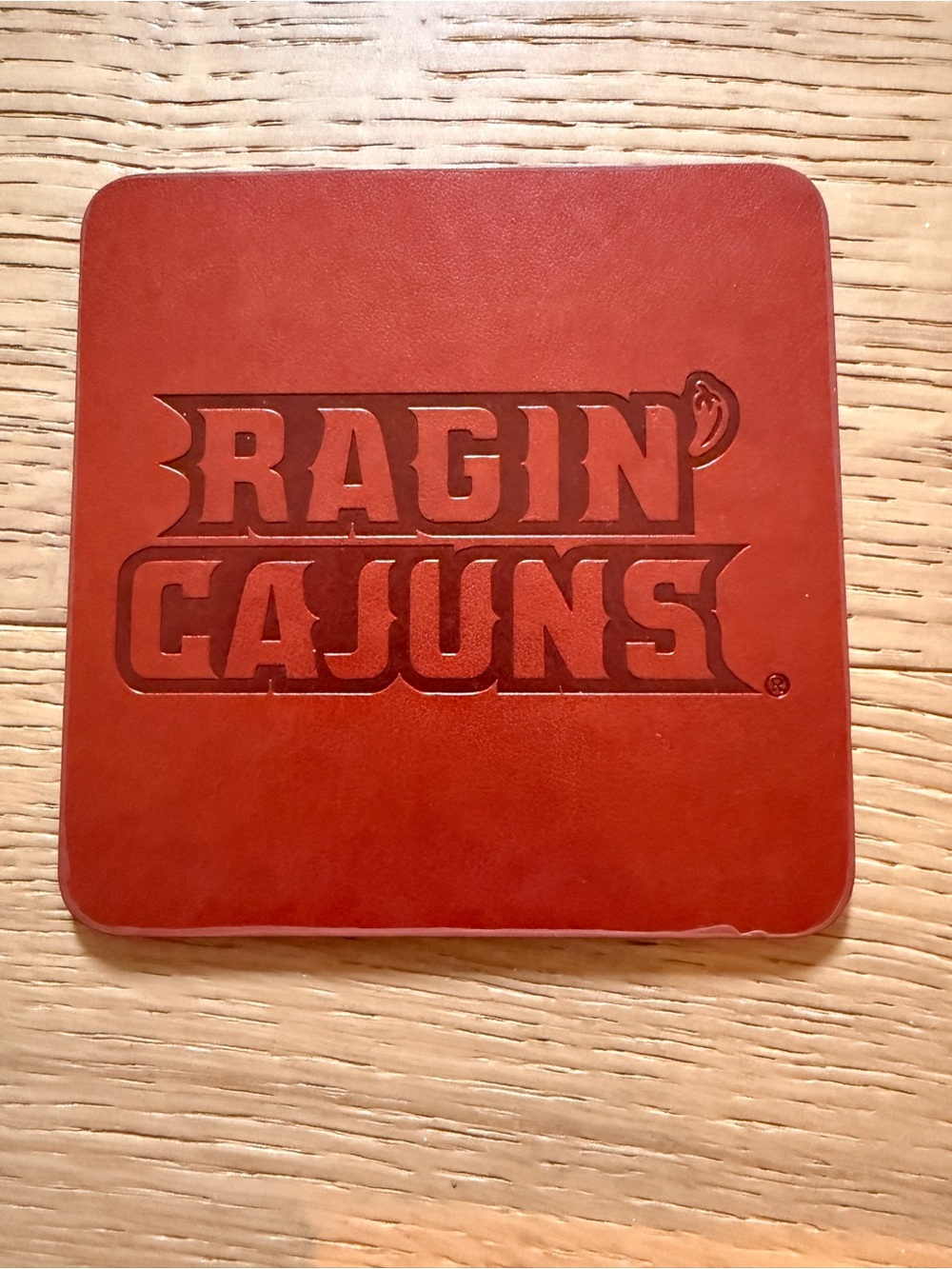 2 Ragin' Cajuns Embossed Leather Coasters: University of Louisiana at Lafayette
